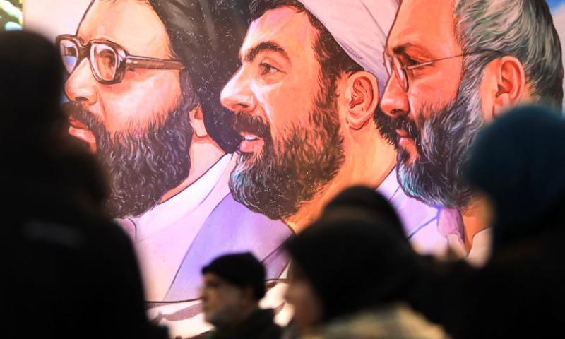 Supporters listen to a speech of Hezbollah leader Sayyed Hassan Nasrallah in the southern suburb of Beirut, Lebanon, on Feb. 16, 2024. Nasrallah on Friday said Israel will pay a heavy price for killing women and children in airstrikes on Nabatieh and al-Sawaneh in southern Lebanon, local TV channel al-Manar reported. (Xinhua/Bilal Jawich)