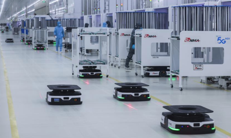 Smart robots operate at a workshop of Ronma Solar in Jinhua City, east China's Zhejiang Province, Feb. 19, 2024. Factories across China have gradually resumed operations as the country's most celebrated holiday Spring Festival ends. (Xinhua/Xu Yu)