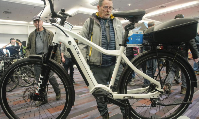 A man looks at an electric bicycle during the BC Bike Show at the Vancouver Convention Center in Vancouver, British Columbia, Canada, on March 2, 2024.
The two-day bicycle consumer show features the latest products and services from approximately 70 exhibitors and aims at promoting cycling culture and fostering eco-friendly living. (Photo by Liang Sen/Xinhua)
