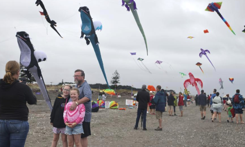 People fly kites during the 2024 Otaki Kite Festival held on the beach of Otaki, Wellington, New Zealand, Feb. 17, 2024. Hundreds of colourful kites were flying in the sky of Wellington's Otaki Beach during the kite festival held from Feb. 17 to 18. (Photo by Meng Tao/Xinhua)