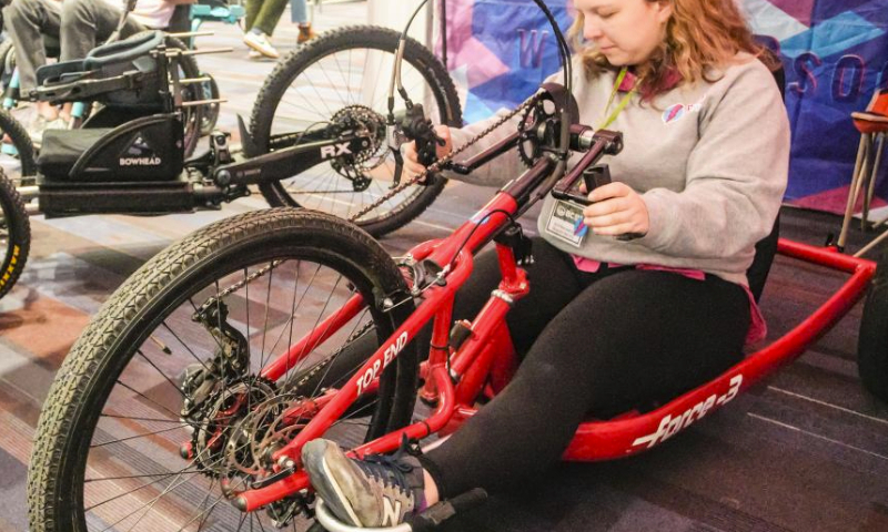 A woman tries out a tricycle during the BC Bike Show at the Vancouver Convention Center in Vancouver, British Columbia, Canada, on March 2, 2024.
The two-day bicycle consumer show features the latest products and services from approximately 70 exhibitors and aims at promoting cycling culture and fostering eco-friendly living. (Photo by Liang Sen/Xinhua)
