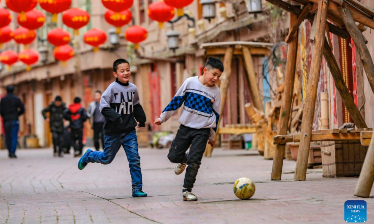 Children play in the ancient city of Kashgar, northwest China's Xinjiang Uygur Autonomous Region, Feb. 5, 2024. Photo:Xinhua