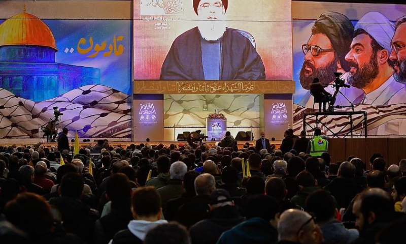 Supporters listen to a speech of Hezbollah leader Sayyed Hassan Nasrallah in the southern suburb of Beirut, Lebanon, on Feb. 16, 2024. Nasrallah on Friday said Israel will pay a heavy price for killing women and children in airstrikes on Nabatieh and al-Sawaneh in southern Lebanon, local TV channel al-Manar reported. (Xinhua/Bilal Jawich)