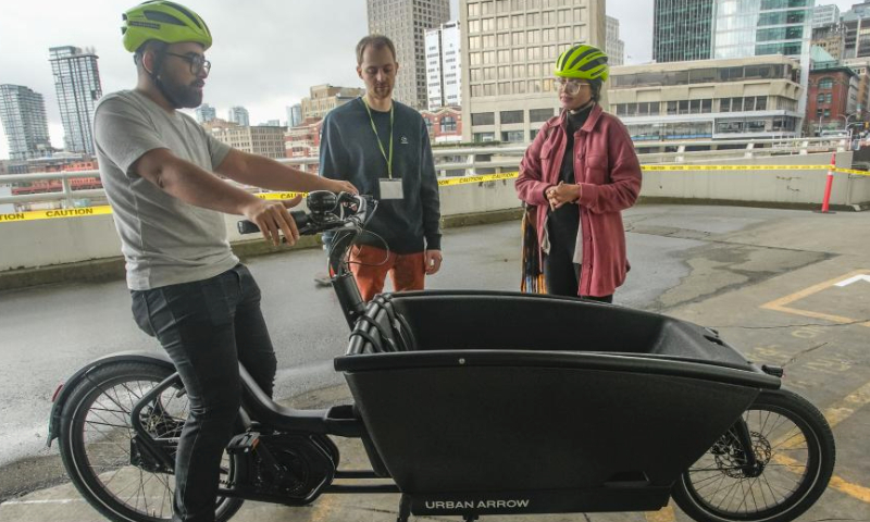 A man tries out a cargo bicycle during the BC Bike Show at the Vancouver Convention Center in Vancouver, British Columbia, Canada, on March 2, 2024.
The two-day bicycle consumer show features the latest products and services from approximately 70 exhibitors and aims at promoting cycling culture and fostering eco-friendly living. (Photo by Liang Sen/Xinhua)