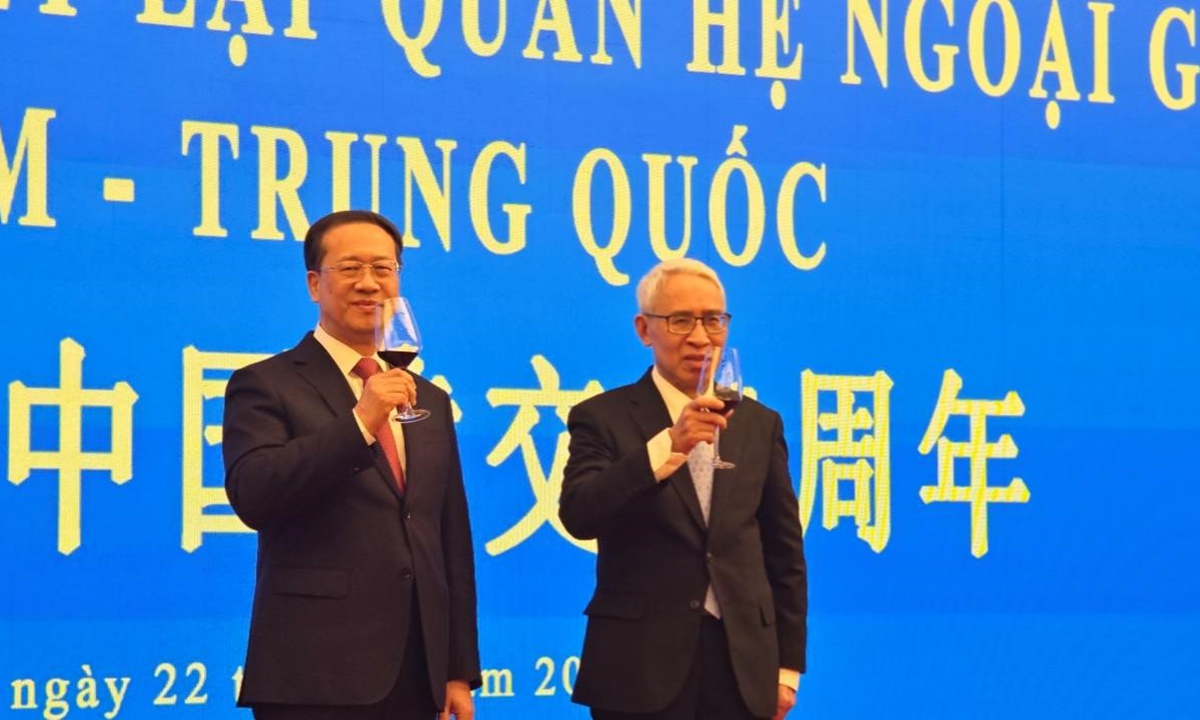 Chinese Vice Foreign Minister Ma Zhaoxu (left) and Vietnamese Ambassador to China Pham Sao Mai attend the reception to commemorate the 74th anniversary of the establishment of diplomatic relations between China and Vietnam in Beijing on January 22, 2024. Photo: Yang Hengrui/GT