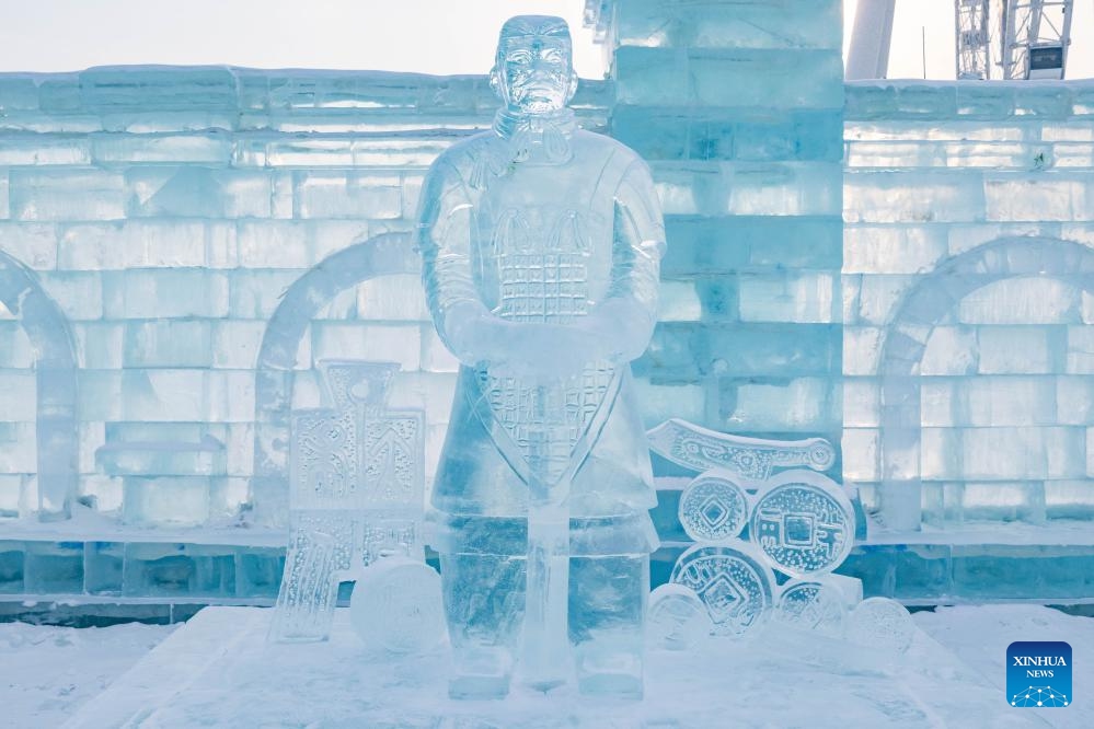 An ice sculpture of a Terracotta Warrior is seen in Harbin Ice and Snow World in Harbin, northeast China's Heilongjiang Province, Jan. 23, 2024. As a group of AI-generated images of ice sculptures of Terracotta Warriors went viral on the internet, artists created a series of ice sculptures of Terracotta Warriors at Harbin Ice and Snow World to attract visitors.(Photo: Xinhua)