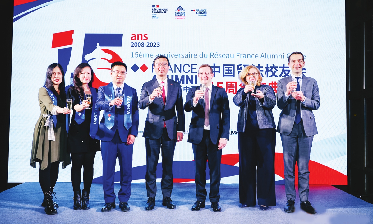 French Ambassador to China Bertrand Lortholary (third from right), makes a toast with other representatives at the celebration event in Beijing. Photo: Courtesy of the French Embassy in Beijing