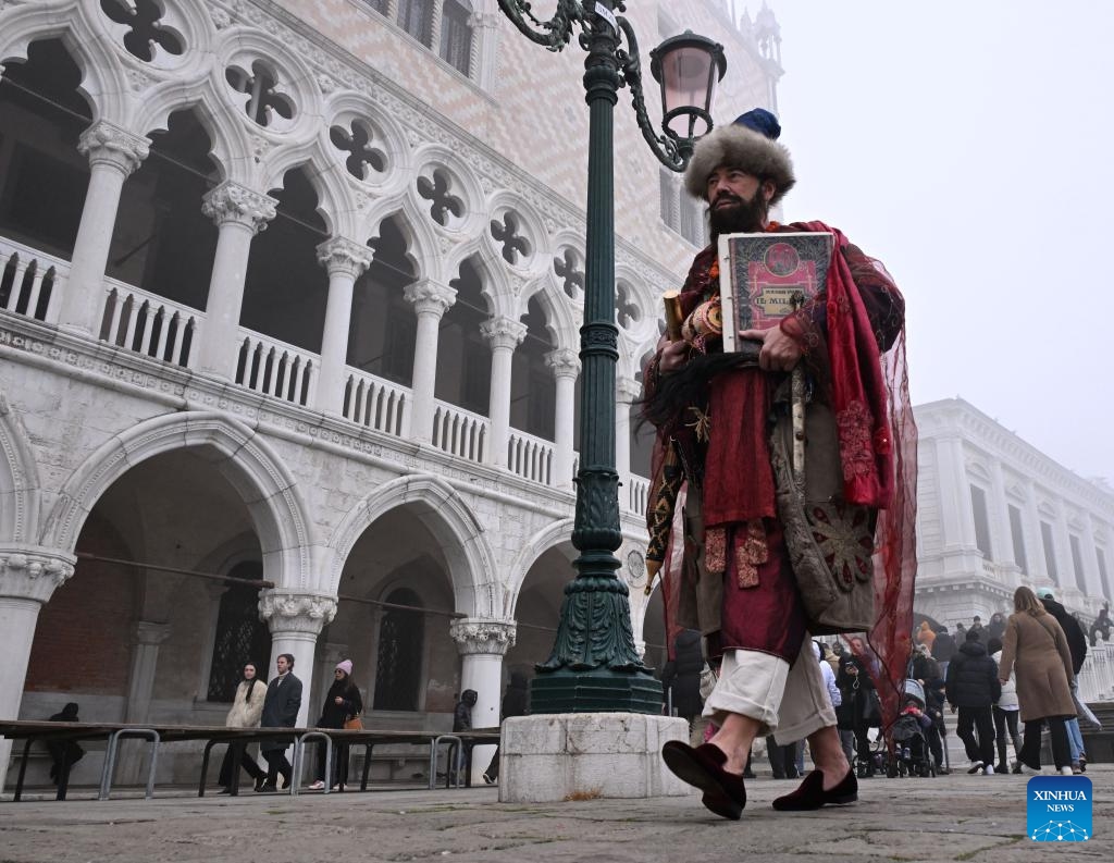 A man dressed in costume is seen during the carnival in Venice, Italy, Jan. 27, 2024. (Photo by Alberto Lingria/Xinhua)