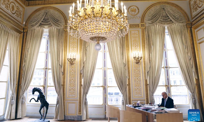 Laurent Fabius, president of the Constitutional Council and former French prime minister, works in Paris, France, Dec. 12, 2023. (Xinhua/Gao Jing)