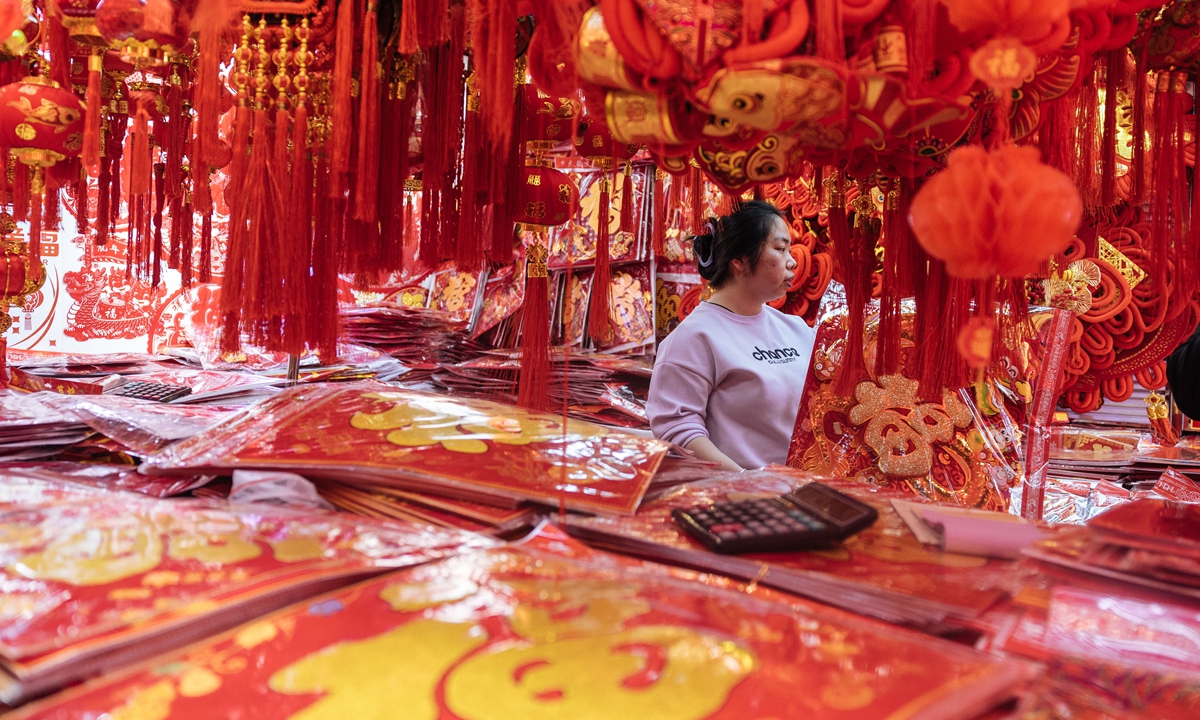 A resident shops for goods in a shopping mall in Fengtai District, Beijing, on January 28, 2024, in preparation for the Spring Festival in February. Photo: Li Hao/GT