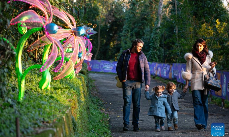 Visitors walk past lanterns during the International Lantern Festival Lanternia in Cassino, central Italy, Jan. 28, 2024. More than 300 Chinese lanterns made by artisans from Zigong, a southwest China's city famous for its lantern making, are exhibited here. Since its opening on Dec. 8, 2023, the lantern show has attracted approximately 80,000 visitors.(Photo: Xinhua)