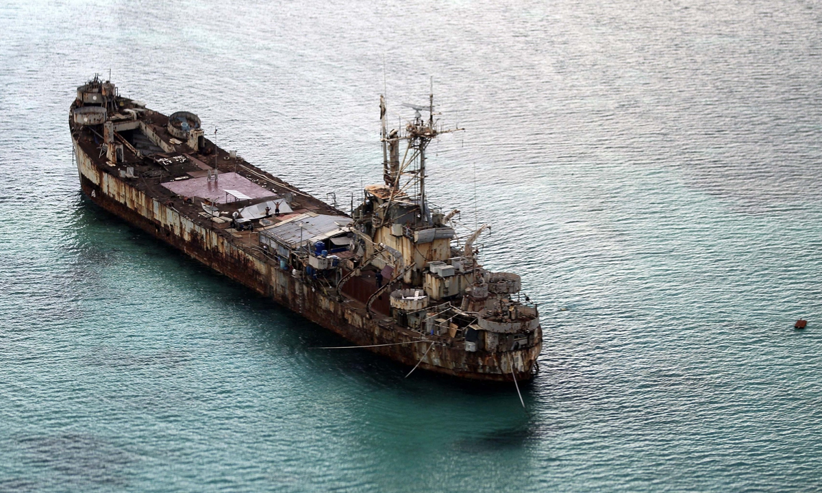 This aerial photograph taken from an aircraft shows the dilapidated Sierra Madre ship of the Philippine Navy 