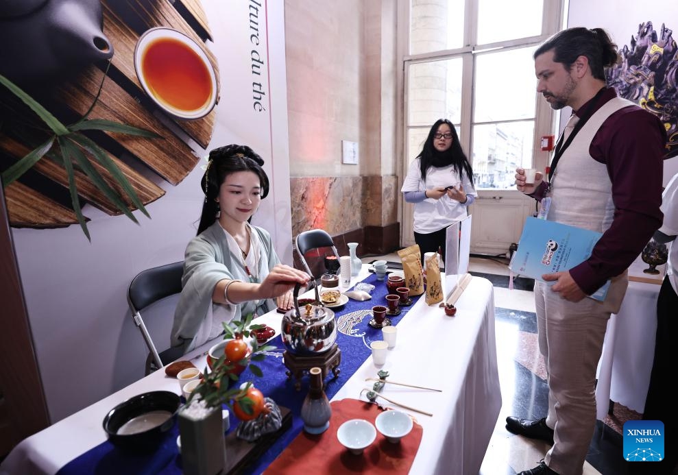 Visitors watch Chinese tea art performance during a tourism promotion event named Nihao! China at the Paris Brongniart in Paris, France, Jan. 30, 2024.(Photo: Xinhua)