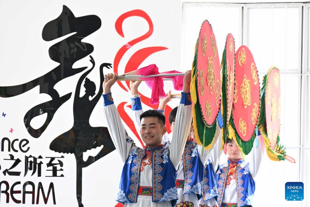 Artists rehearse a dance for the Spring Festival in Shijiazhuang, north China's Hebei Province, Jan. 31, 2024. People across China are preparing for the upcoming Spring Festival, the biggest occasion for family reunions, and heralds the beginning of spring.(Photo: Xinhua)
