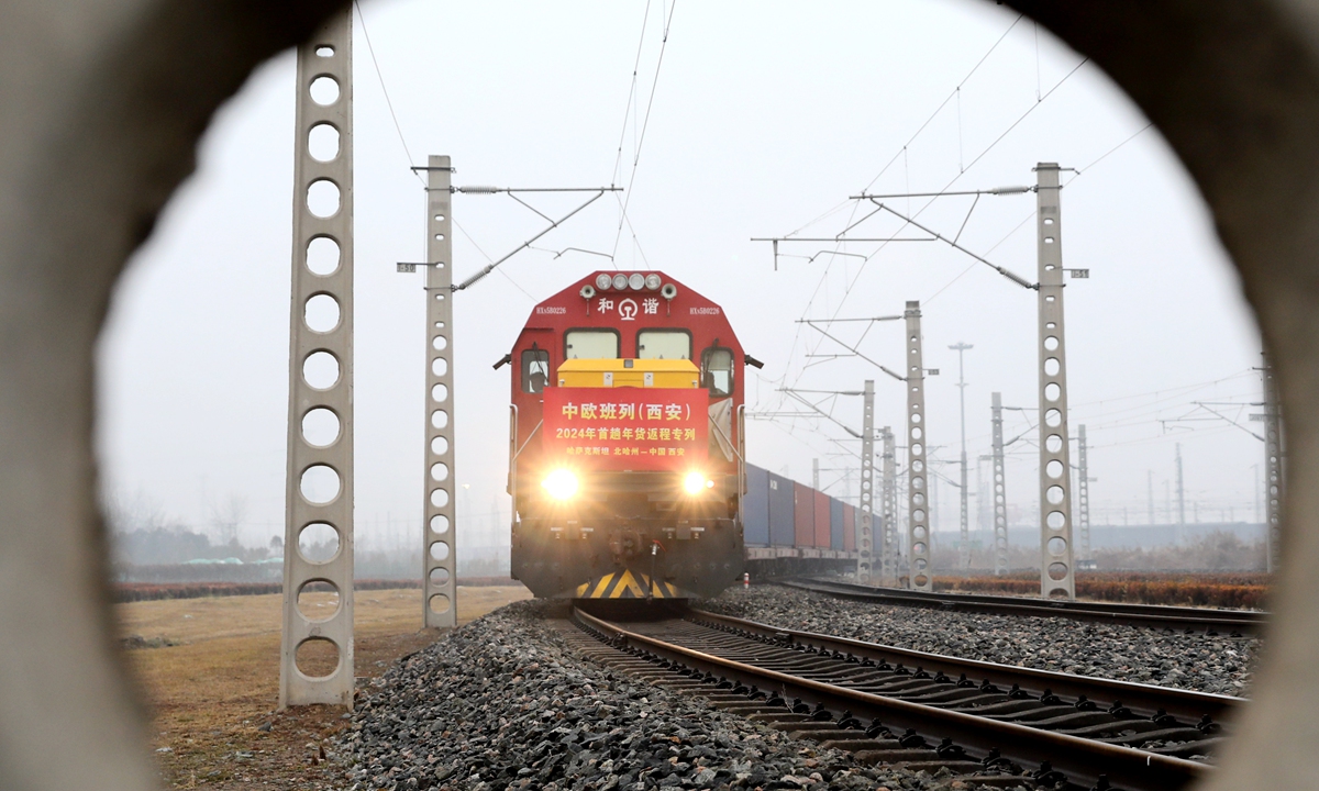 A China-Europe freight train from Kazakhstan carrying raw rapeseed oil arrives at a station in Xi'an, Northwest China's  Shaanxi Province on February 1, 2024. China provided increased market access for imports of agricultural and food products from over 51 countries and regions in 2023, China's customs authorities said recently. Photo: cnsphoto