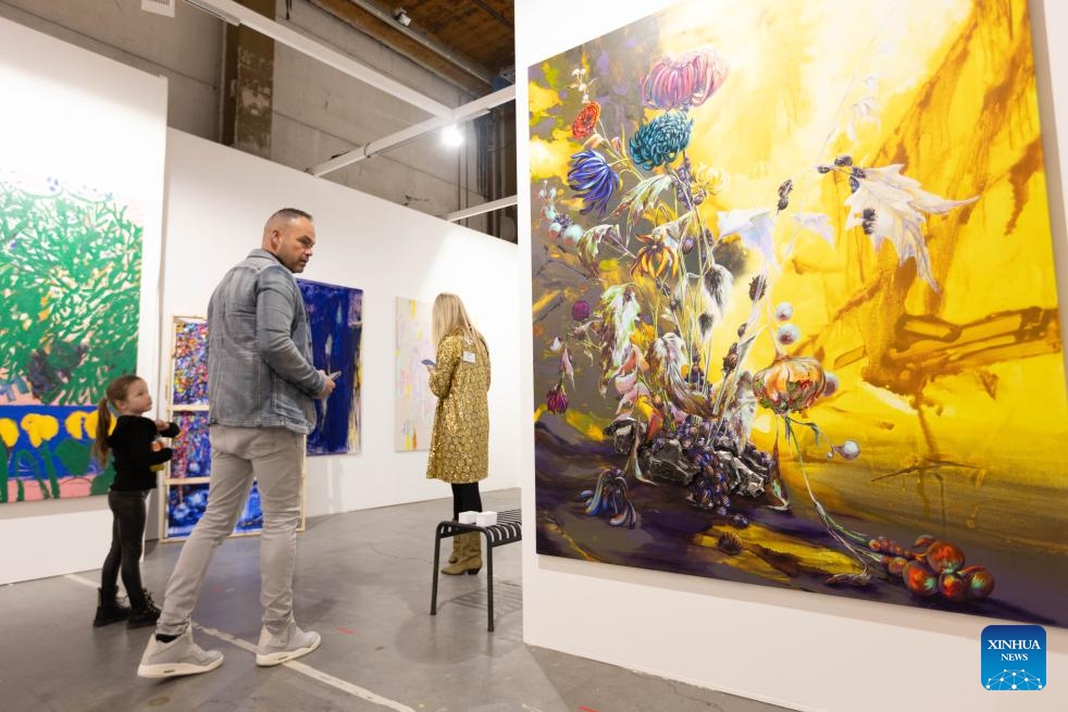 Visitors view artworks at Art Rotterdam, the annual international contemporary art fair, in Rotterdam, the Netherlands, on Jan. 31, 2024.(Photo: Xinhua)
