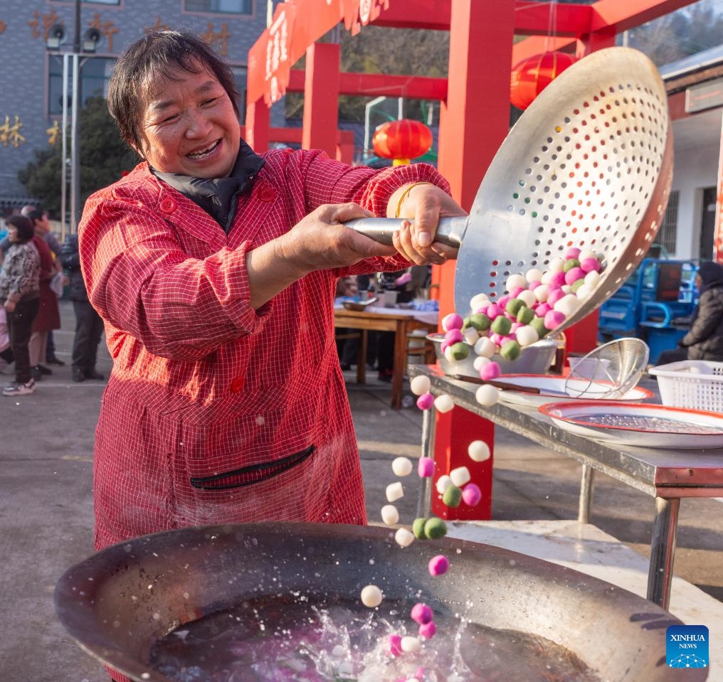 A villager cooks festive sweet dumplings known as tangyuan in Zhuji, east China's Zhejiang Province, Jan. 31, 2024. People across China are preparing for the upcoming Spring Festival, the biggest occasion for family reunions, and heralds the beginning of spring.(Photo: Xinhua)