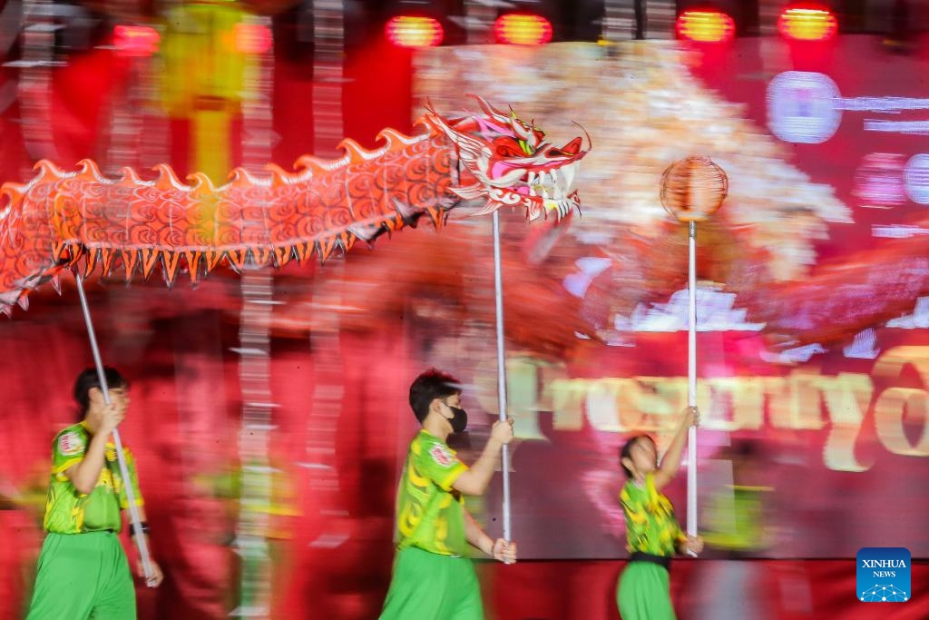 Dragon dancers perform during the ceremonial lighting of the prosperity tree to celebrate the upcoming Chinese Lunar New Year at Chinatown in Manila, the Philippines, on Feb. 1, 2024.(Photo: Xinhua)