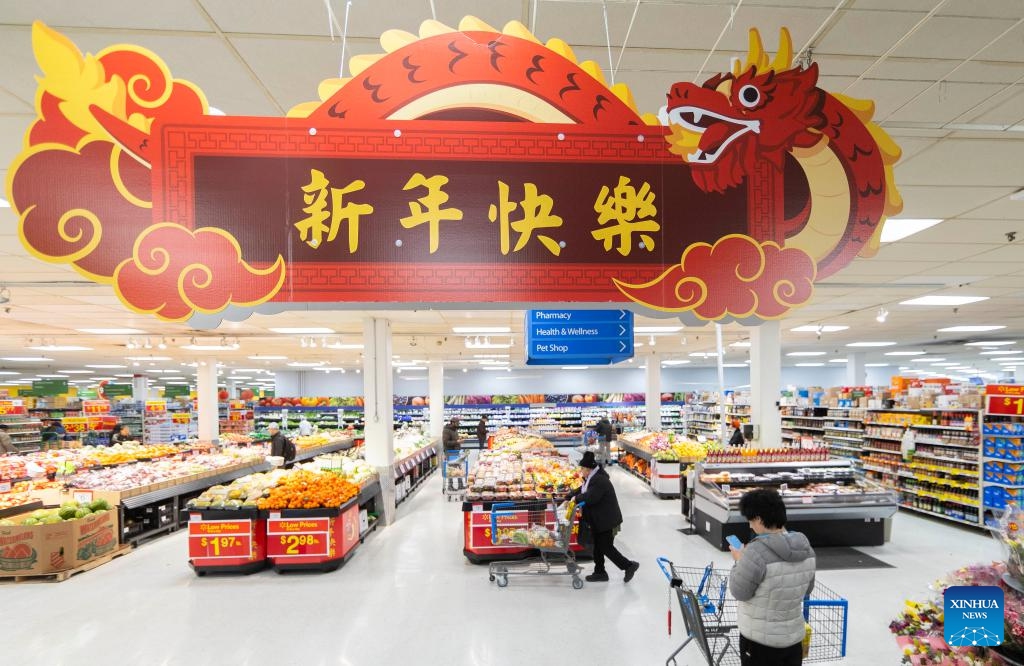 A decoration marking the upcoming Chinese Lunar New Year of the Dragon is seen at a Walmart store in Toronto, Canada, on Feb. 2, 2024. Many shopping malls and supermarkets here have put up themed decorations to celebrate the upcoming Chinese Lunar New Year of the Dragon.(Photo: Xinhua)