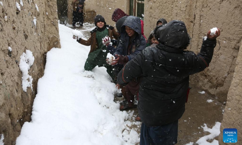 Children play in snow in Kabul, capital of Afghanistan, on Feb. 3, 2024. (Photo by Saifurahman Safi/Xinhua)