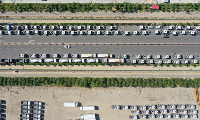 This aerial photo taken on July 26, 2023 shows domestically-made vehicles at the Horgos comprehensive bonded area in northwest China's Xinjiang Uygur Autonomous Region. More and more domestically-made automobiles have been exported through the Horgos Port, one of China's closest ports to Central Asia and Europe by land transport, to countries along the Belt and Road, including Kazakhstan, Uzbekistan and Russia. Photo: Xinhua