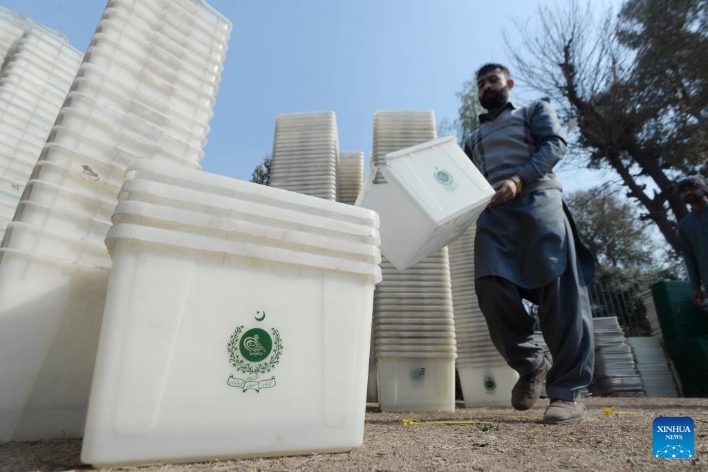 A worker sorts ballot boxes to be sent to polling stations ahead of general elections in northwest Pakistan's Peshawar on Feb. 5, 2024. Pakistan will hold general elections on Feb. 8 during which about 127 million voters will cast their votes for national and provincial assembly candidates competing on 859 constituencies across the country, according to the Election Commission of Pakistan.(Photo: Xinhua)