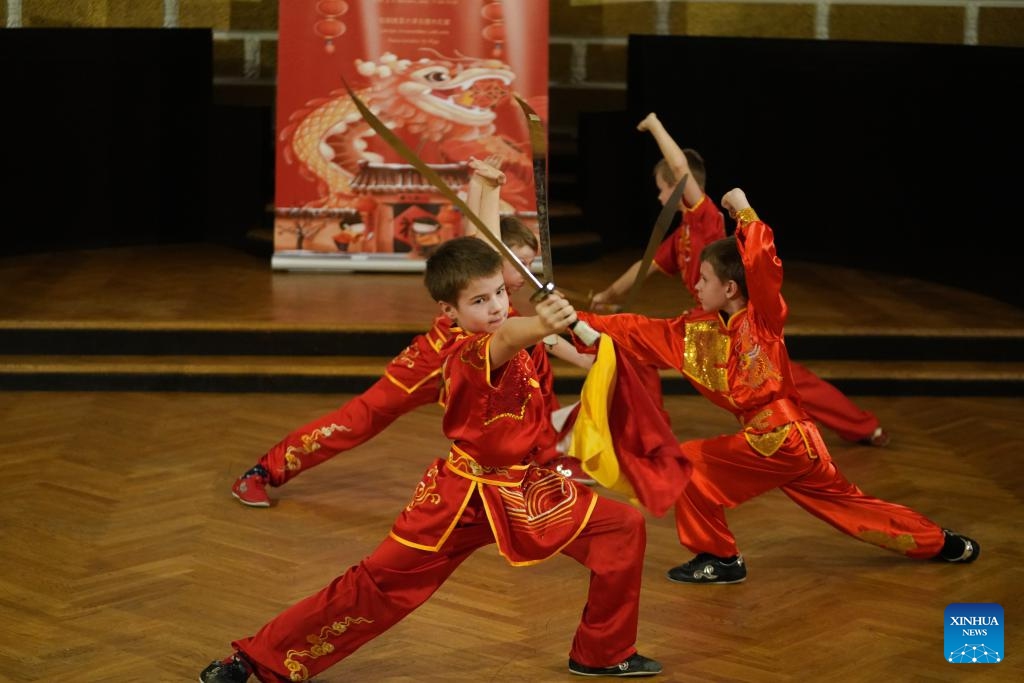 Local students perform Wushu during an event celebrating the upcoming Chinese Lunar New Year, or the Spring Festival, at the Confucius Institute of the University of Latvia in Riga, Latvia, Feb. 5, 2024.(Photo: Xinhua)