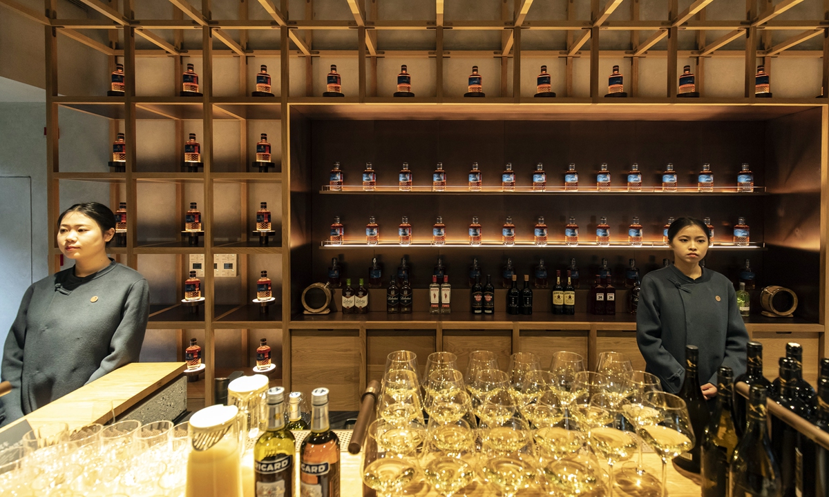 China-made Whiskies are displayed at a shop in Emeishan, Southwest China’s Sichuan Province, on December 13, 2023. 