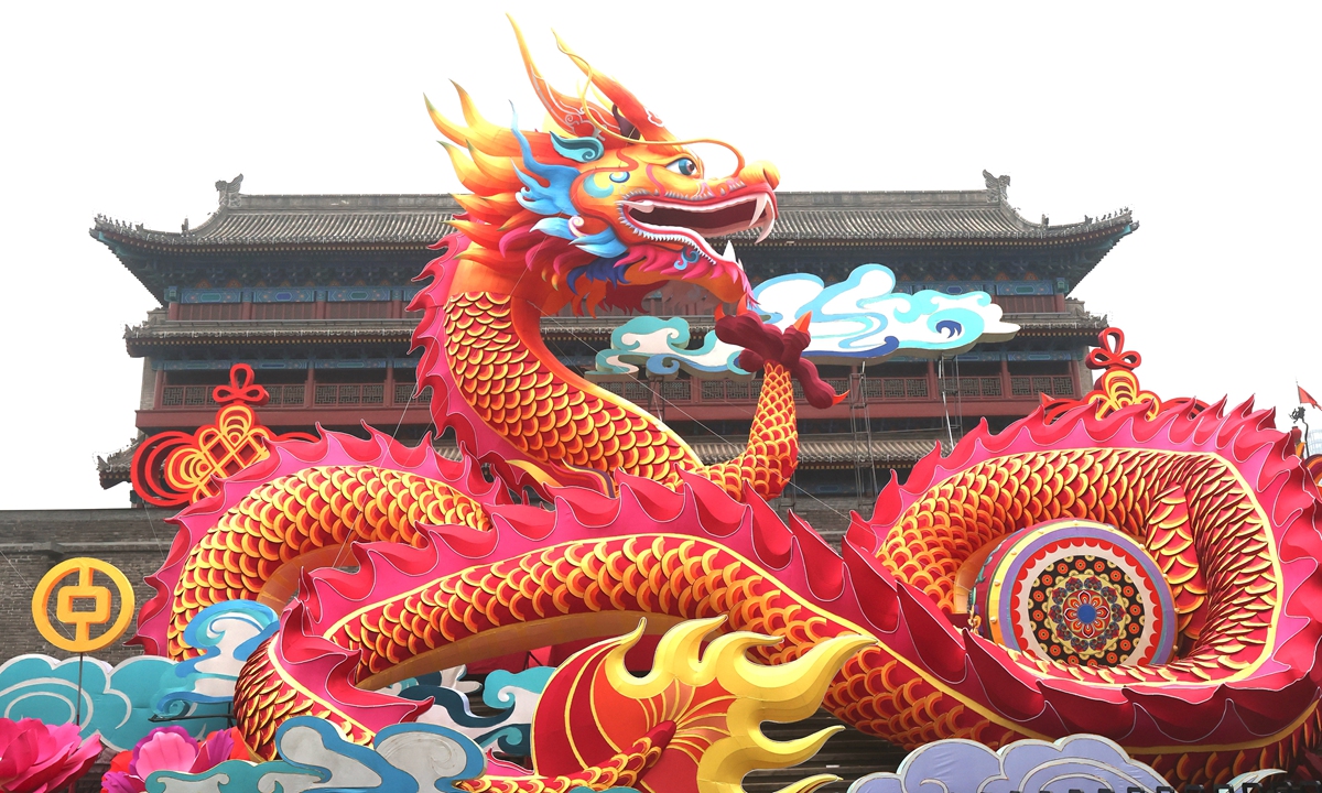 A massive 18-meter high dragon goes on display in Yongningmen, the south gate of the Xi'an City Wall scenic area, Shaanxi Province, to celebrate the upcoming Spring Festival. Photo: VCG