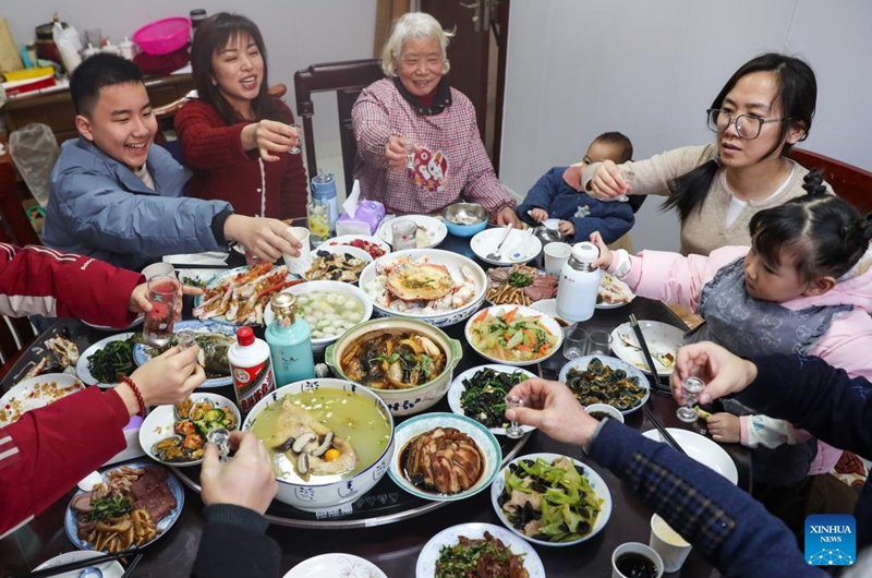 People across China have family reunion dinners on Chinese Lunar New