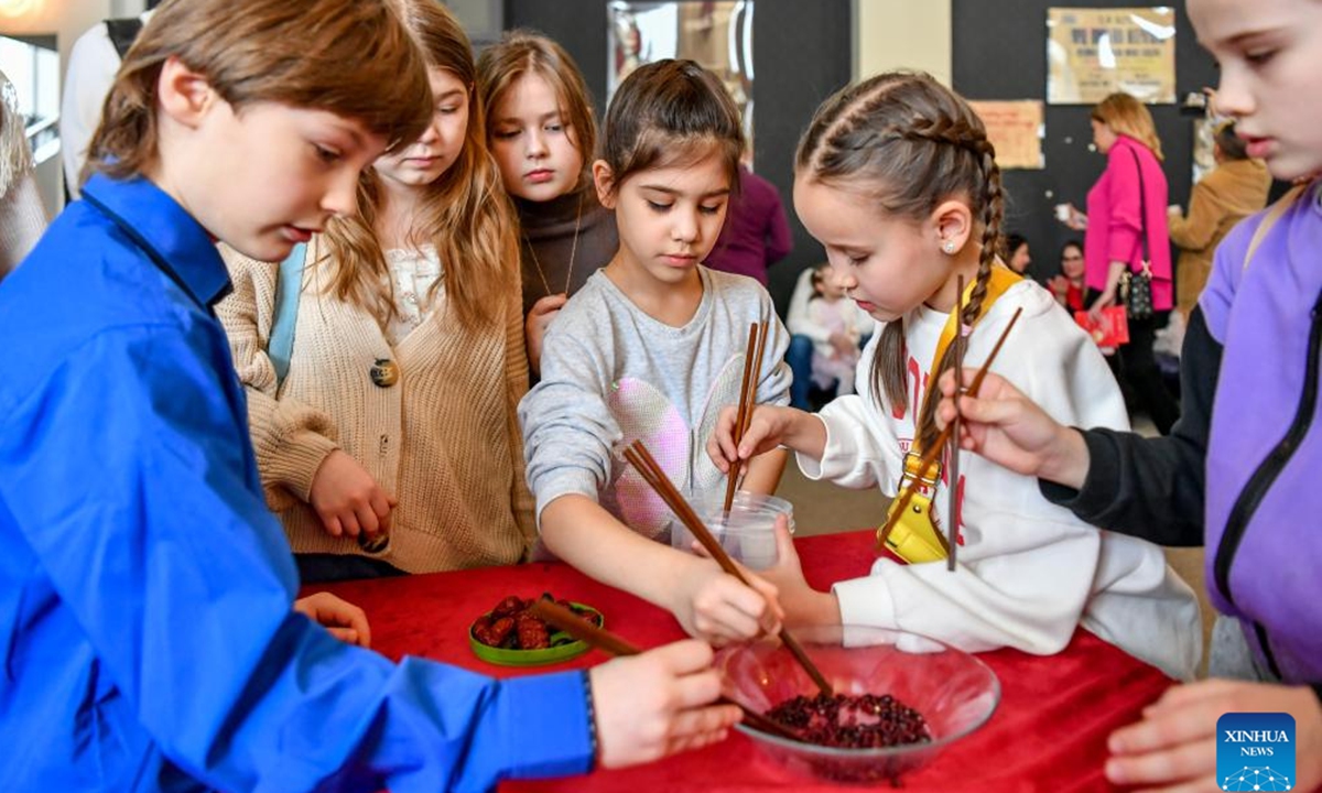 Children learn to use chopsticks during an event celebrating the Chinese Lunar New Year, or the Spring Festival, in Moscow, Russia, Feb. 11, 2024. (Xinhua/Cao Yang)





