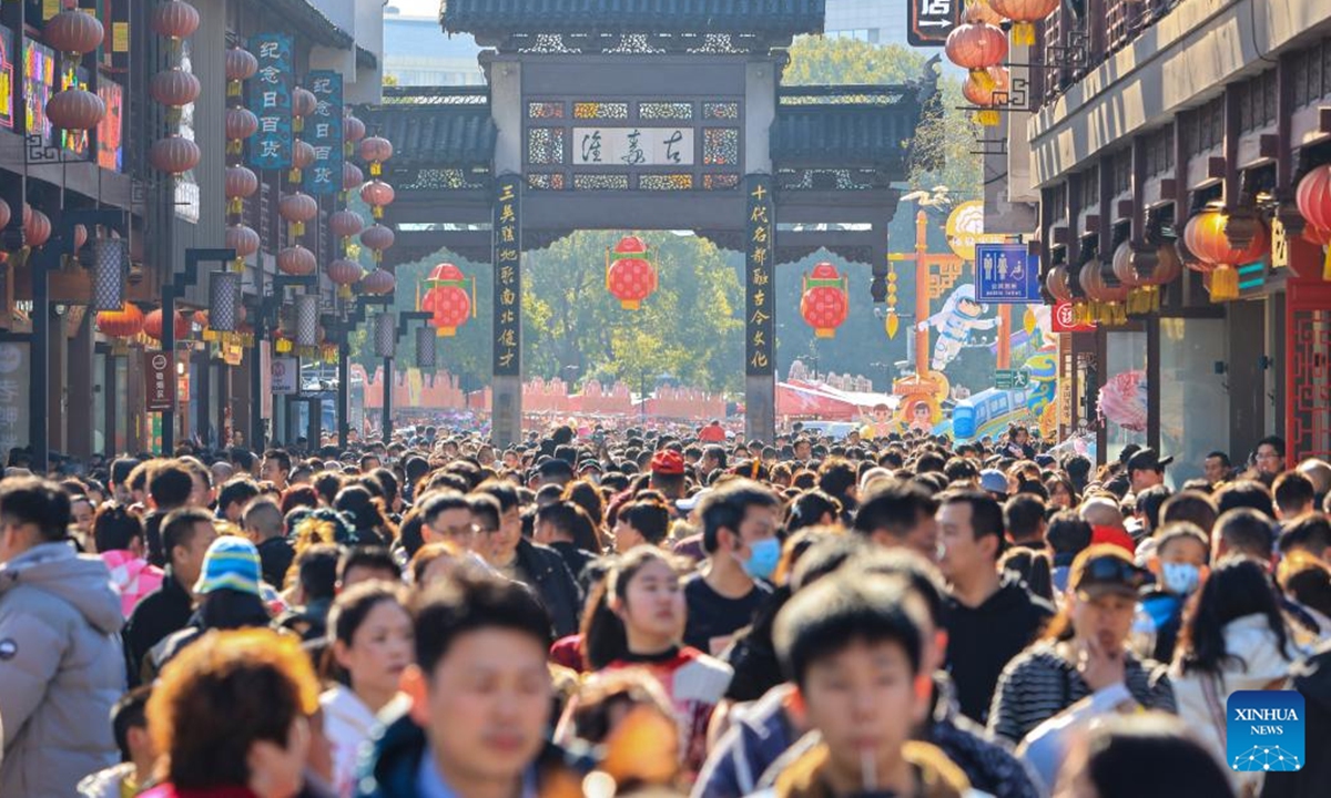 People visit Fuzimiao, or the Confucius Temple, in Nanjing, east China's Jiangsu Province, Feb. 12, 2024. People across China are enjoying temple fairs, lantern shows and other events to celebrate the Chinese Lunar New Year and embrace the festive atmosphere. (Photo by Su Yang/Xinhua)



