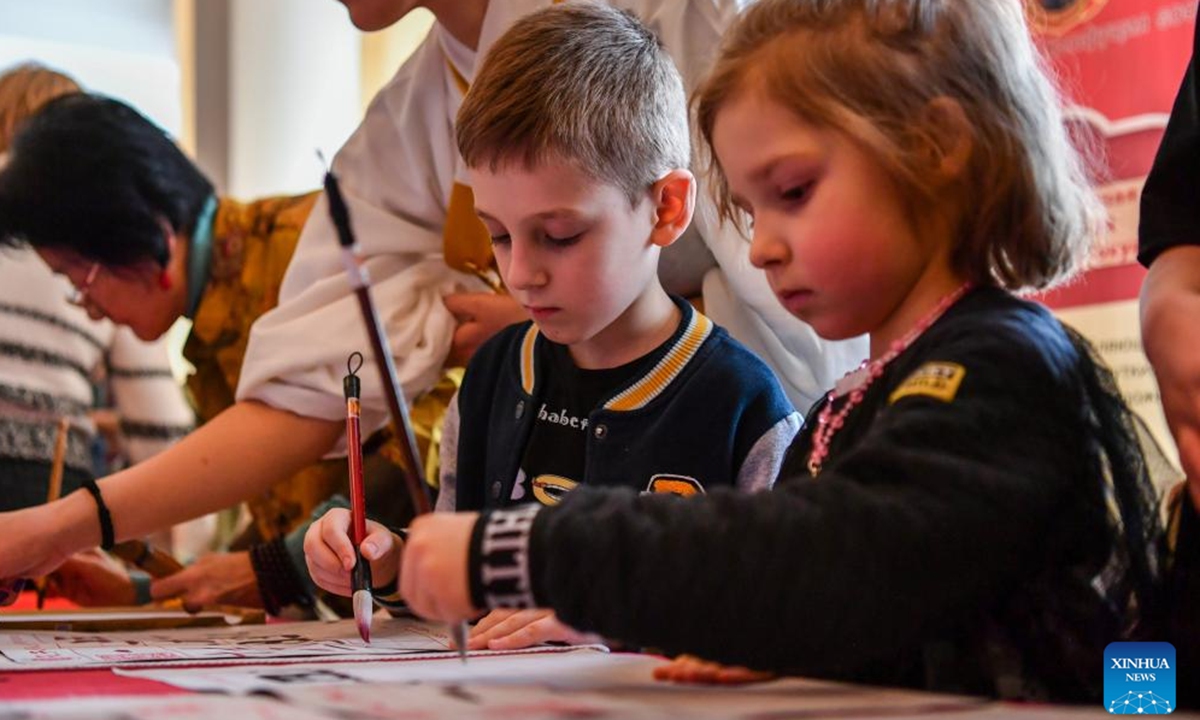 Children try Chinese calligraphy during an event celebrating the Chinese Lunar New Year, or the Spring Festival, in Moscow, Russia, Feb. 11, 2024. (Xinhua/Cao Yang)




