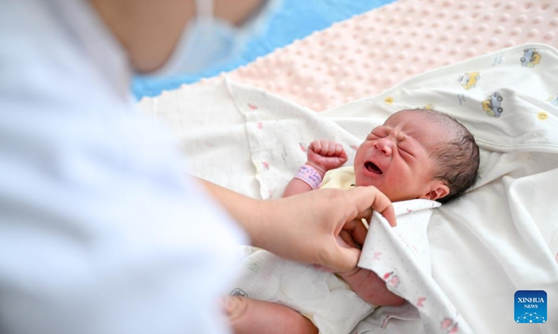 A nurse takes care of a newborn baby, whose Chinese zodiac sign is dragon, at a hospital in Ulanqab, north China's Inner Mongolia Autonomous Region, Feb. 10, 2024. According to the Chinese zodiac and tradition, the Year of Dragon symbolizes courage, auspiciousness and good luck. (Photo: Xinhua)