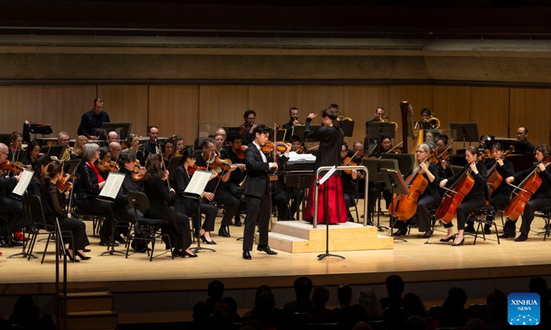 Artists perform at Roy Thomson Hall in Toronto, Canada, Feb. 13, 2024. A concert in celebration of the Chinese New Year of the Dragon was held here by the Toronto Symphony Orchestra on Tuesday. (Photo: Xinhua)