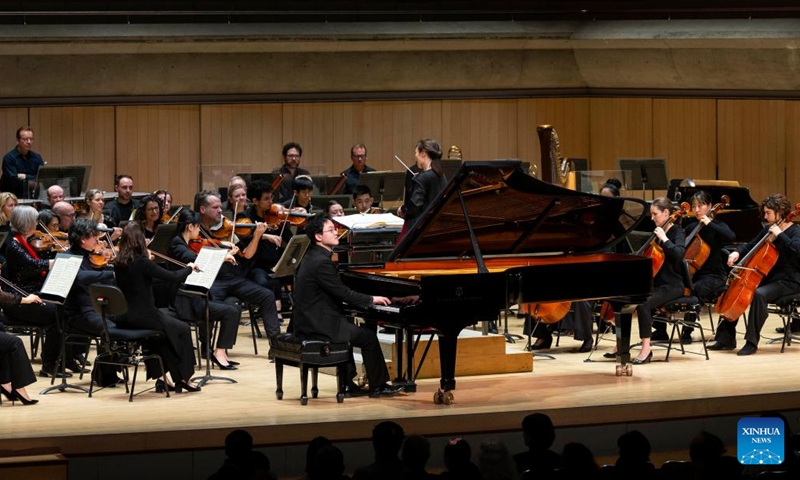 Artists perform at Roy Thomson Hall in Toronto, Canada, Feb. 13, 2024. A concert in celebration of the Chinese New Year of the Dragon was held here by the Toronto Symphony Orchestra on Tuesday. (Photo: Xinhua)