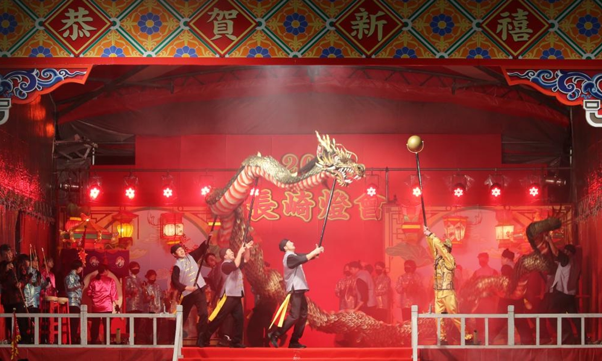 Actors perform dragon dance at a lantern festival celebrating the Chinese New Year in Nagasaki, Japan, Feb. 14, 2024. (Xinhua/Yang Guang)