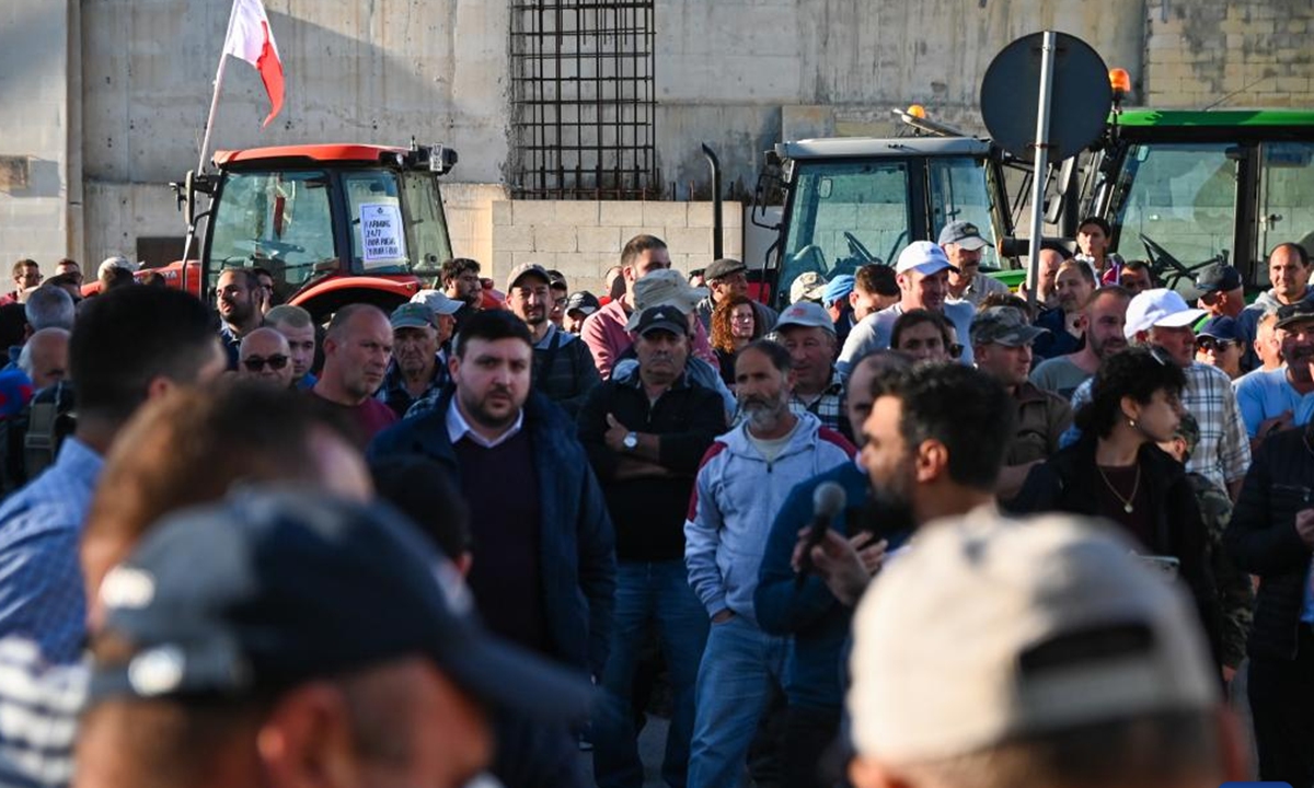 Farmers participate in a protest in Valletta, Malta, on Feb. 15, 2024. Maltese farmers staged a new wave of protest on Thursday, demanding more economic support from their government and reiterating opposition to some European Union (EU) policies related to agriculture and environment protection. (Photo by Jonathan Borg/Xinhua)