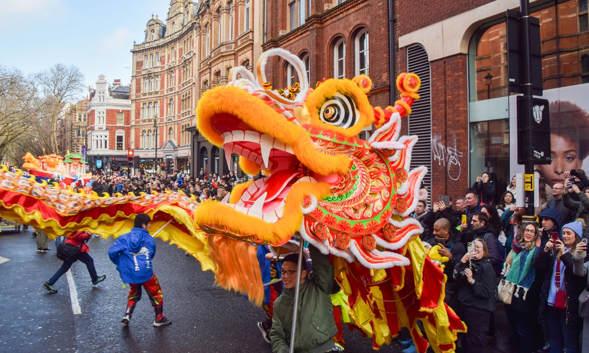 Dragon performers entertain the crowd during the Chinese New Year parade in London on February 11, 2024. Photo: VCG
