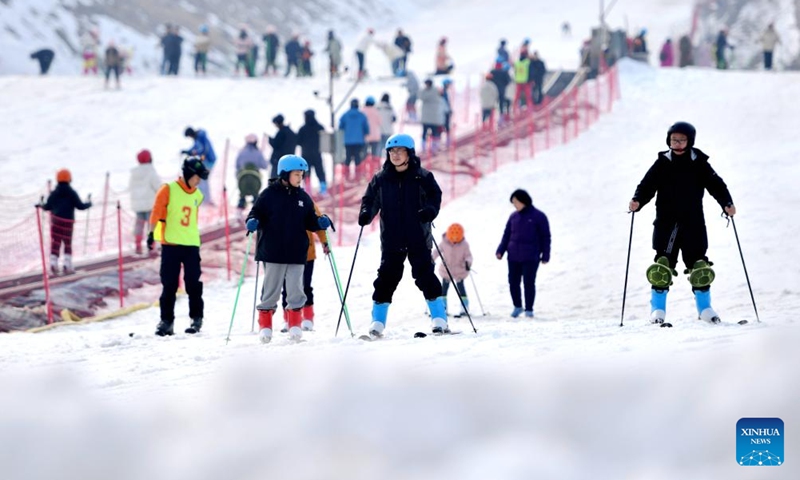 People enjoy skiing in Yuanshi County of Shijiazhuang City, north China's Hebei Province, Feb. 14, 2024. In addition to following traditional customs, more and more Chinese people choose to enrich their life by spending the Spring Festival holiday in diversified and original ways.  (Photo: Xinhua)