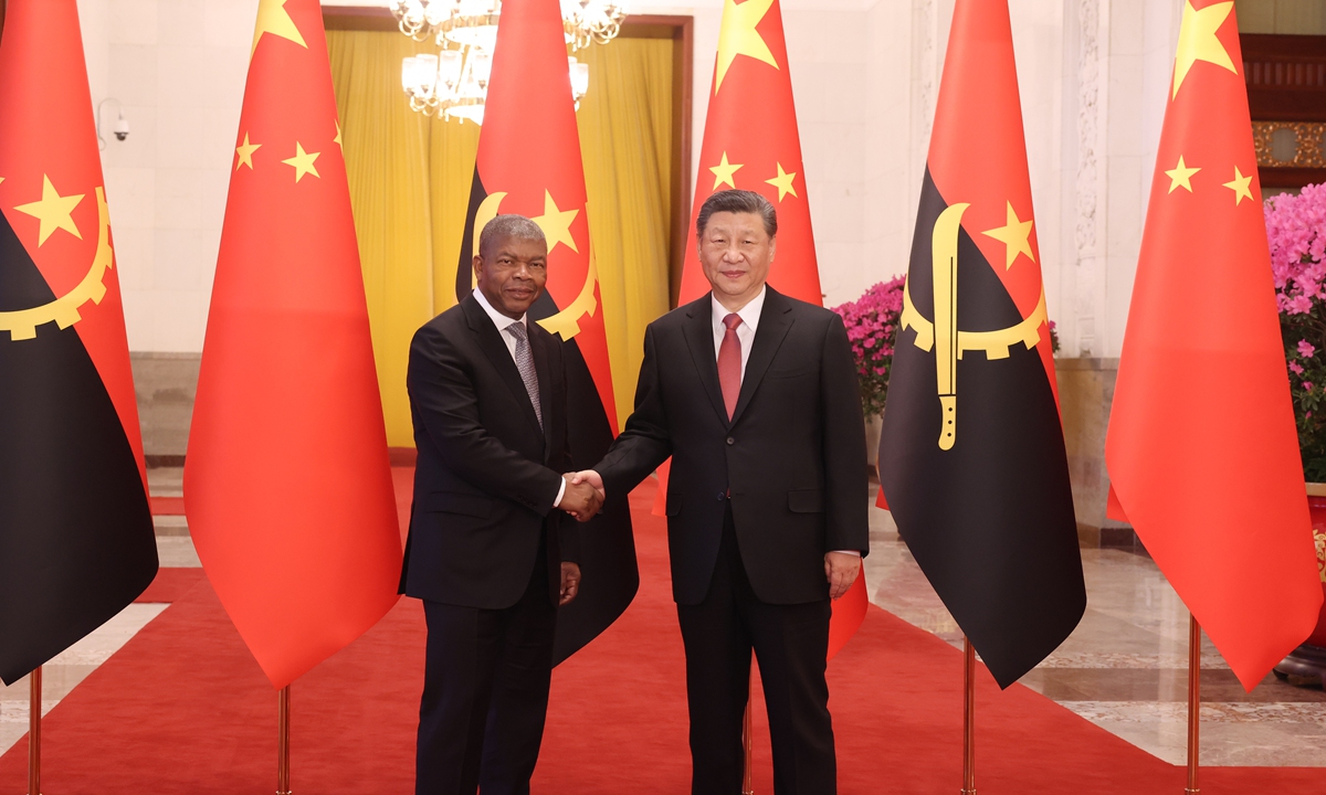 Chinese President Xi Jinping shakes hands with visiting Angolan President Joao Lourenco in Beijing on March 15, 2024. The two heads of state announced the elevation of bilateral relations to a comprehensive strategic cooperative partnership. Photo: cnsphoto 