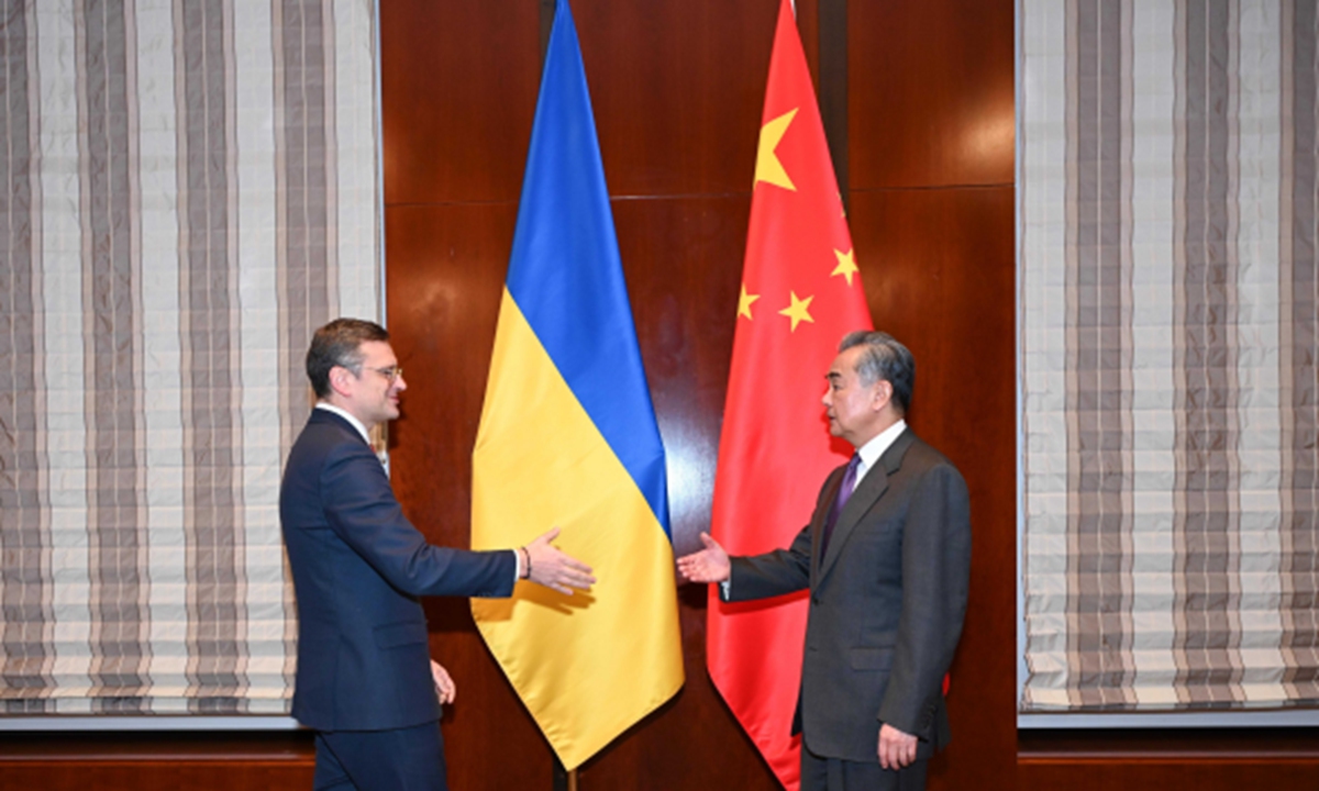 Chinese Foreign Minister Wang Yi, also a member of the Political Bureau of the Communist Party of China Central Committee, meets with Ukrainian Foreign Minister Dmytro Kuleba on February 17, 2024 on sidelines of the Munich Security Conference. Photo: Website of Chinese Foreign Ministry 