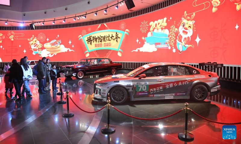 People visit Beijing Auto Museum in Beijing, capital of China, Feb. 16, 2024. In addition to following traditional customs, more and more Chinese People choose to enrich their life by spending the Spring Festival holiday in diversified and original ways. (Photo: Xinhua)