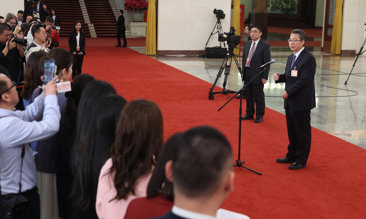 Shen Changyu, head of the China National Intellectual Property Administration, meets journalists after the 14th National People's Congress concludes its second session on March 11, 2024. Foreign applicants held more than 900,000 valid invention patents in China by 2023, up 4.9 percent year on year, showing that foreign enterprises attach great importance to the Chinese market, Shen told the press. Photo: cnsphoto