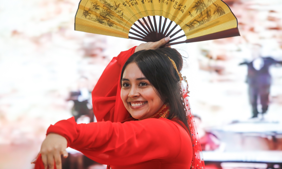 Far left: A dancer performs during a Chinese New Year celebration at El Salvador National Library on February 14, 2024 in San Salvador. Photo: VCG