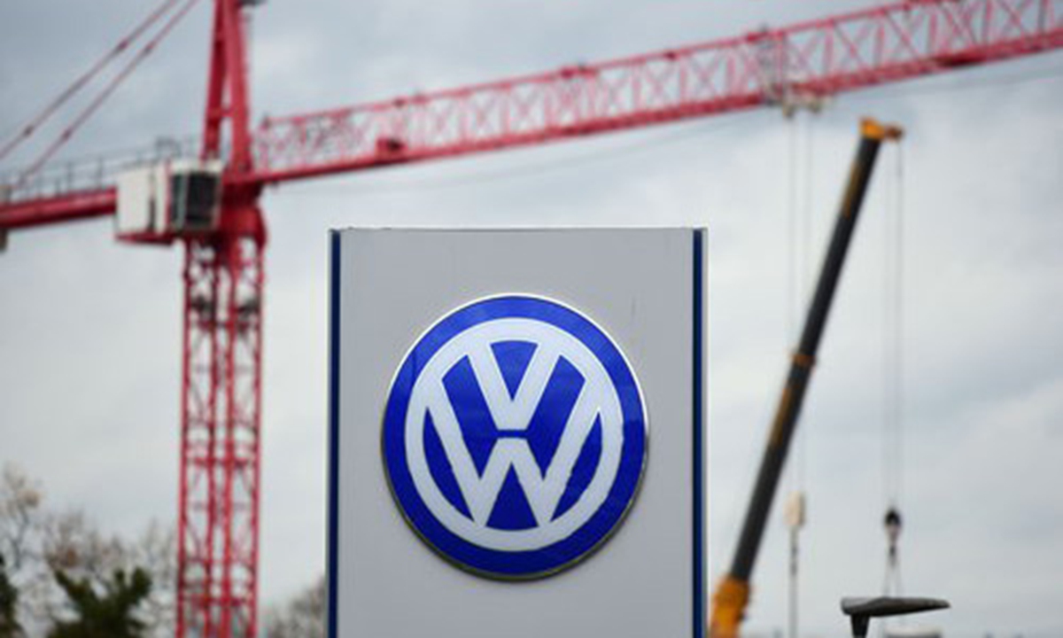 The Volkswagen stands near the cranes of a construction site in Wolfsburg, Germany. File photo: CFP