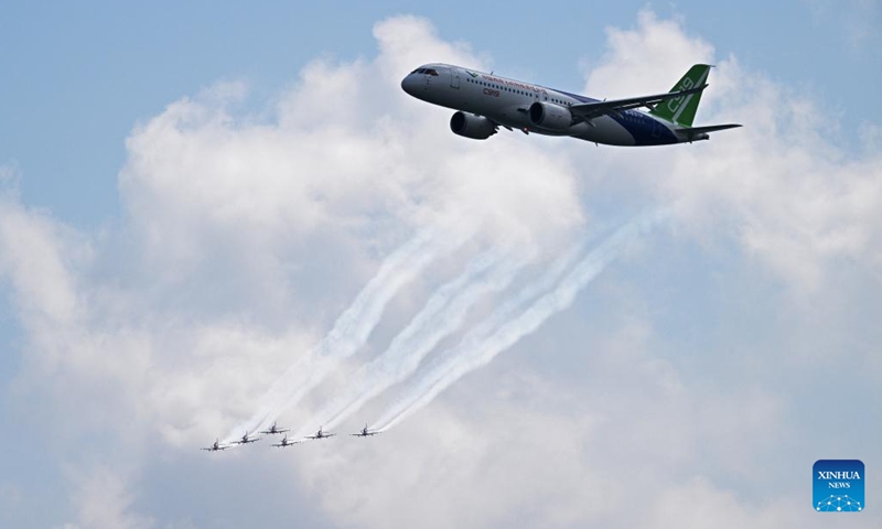 A Chinese passenger jet C919 makes a rehearsal flight to prepare for the upcoming Singapore Airshow in Singapore, Feb. 18, 2024.(Photo: Xinhua)