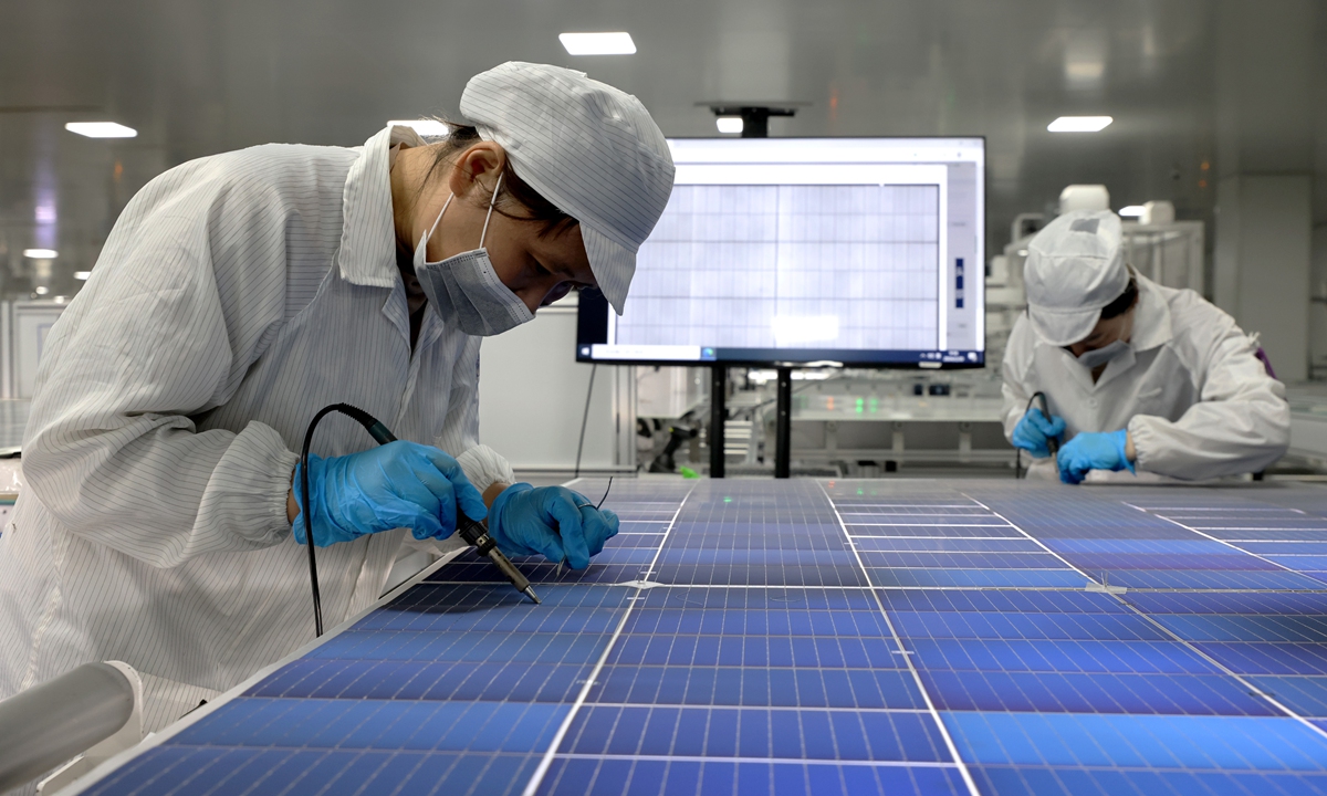 Workers gear up for orders at a photovoltaic product company in Zaozhuang, East China's Shandong Province, on February 20, 2024, following the conclusion of the Chinese Lunar New Year holidays. New-energy products, such as solar panels, have emerged as a booming driver for China's exports. Photo: VCG