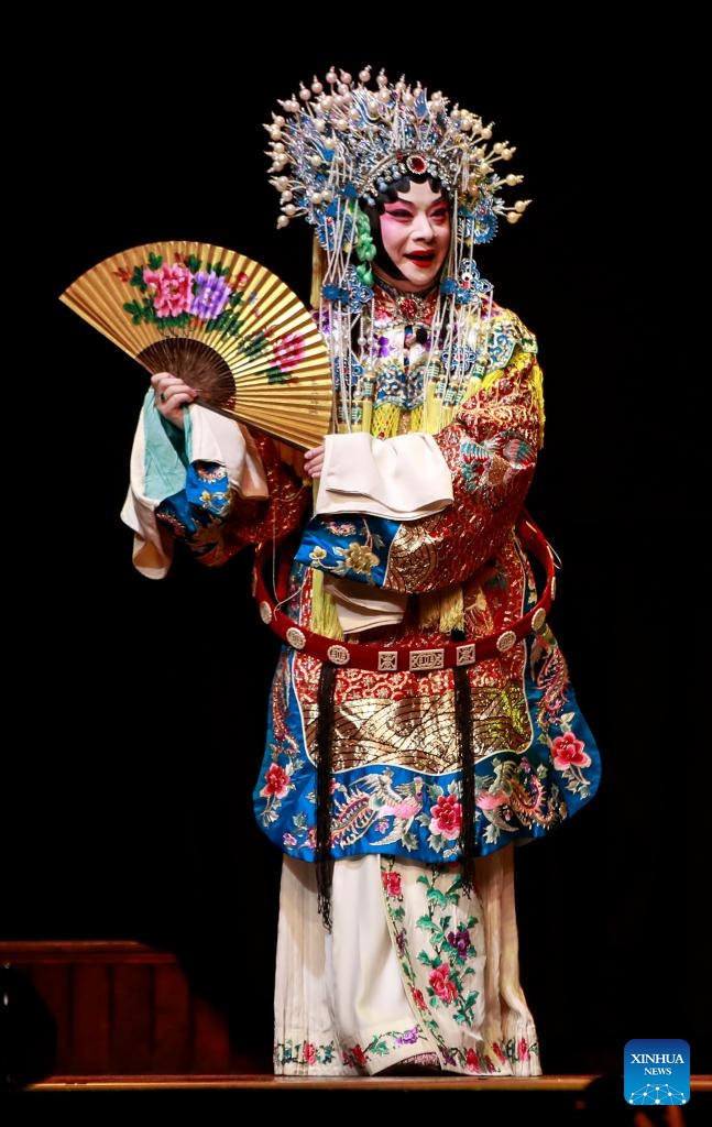 Peking Opera artist Hu Wenge, who is the third-generation successor of the Mei School of Peking Opera, performs during the Festival of Spring Chinese Lunar New Year Gala Night in Sydney, Australia, Feb. 21, 2024. The Festival of Spring is a national cultural brand hosted by the Overseas Chinese Affairs Office of China's State Council, and the All-China Federation of Returned Overseas Chinese, a Chinese civic organization.(Photo: Xinhua)