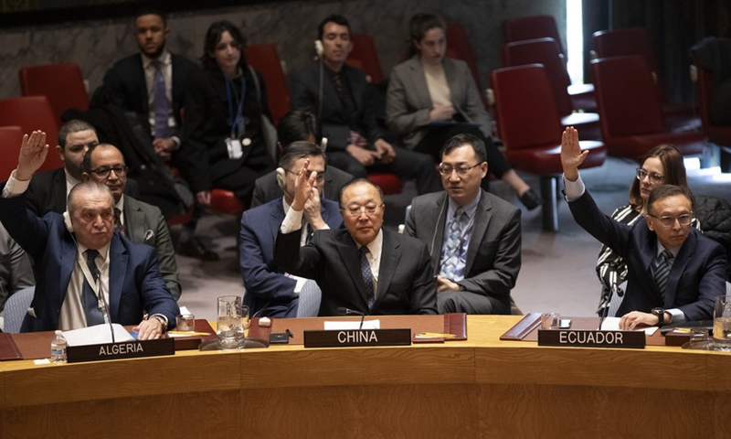 Zhang Jun (C, Front), China's permanent representative to the United Nations, votes in favor of a Security Council draft resolution demanding an immediate humanitarian cease-fire in Gaza, at the UN headquarters in New York, on Feb. 20, 2024. Photo: Xinhua